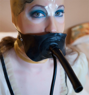 Anna Rose in the Inflatable Rubber Gag with breath tube
