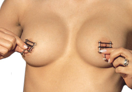 Thumbscew Nipple Clamps on Breast